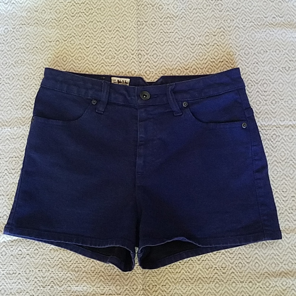 Dark blue high waisted Volcom shorts.